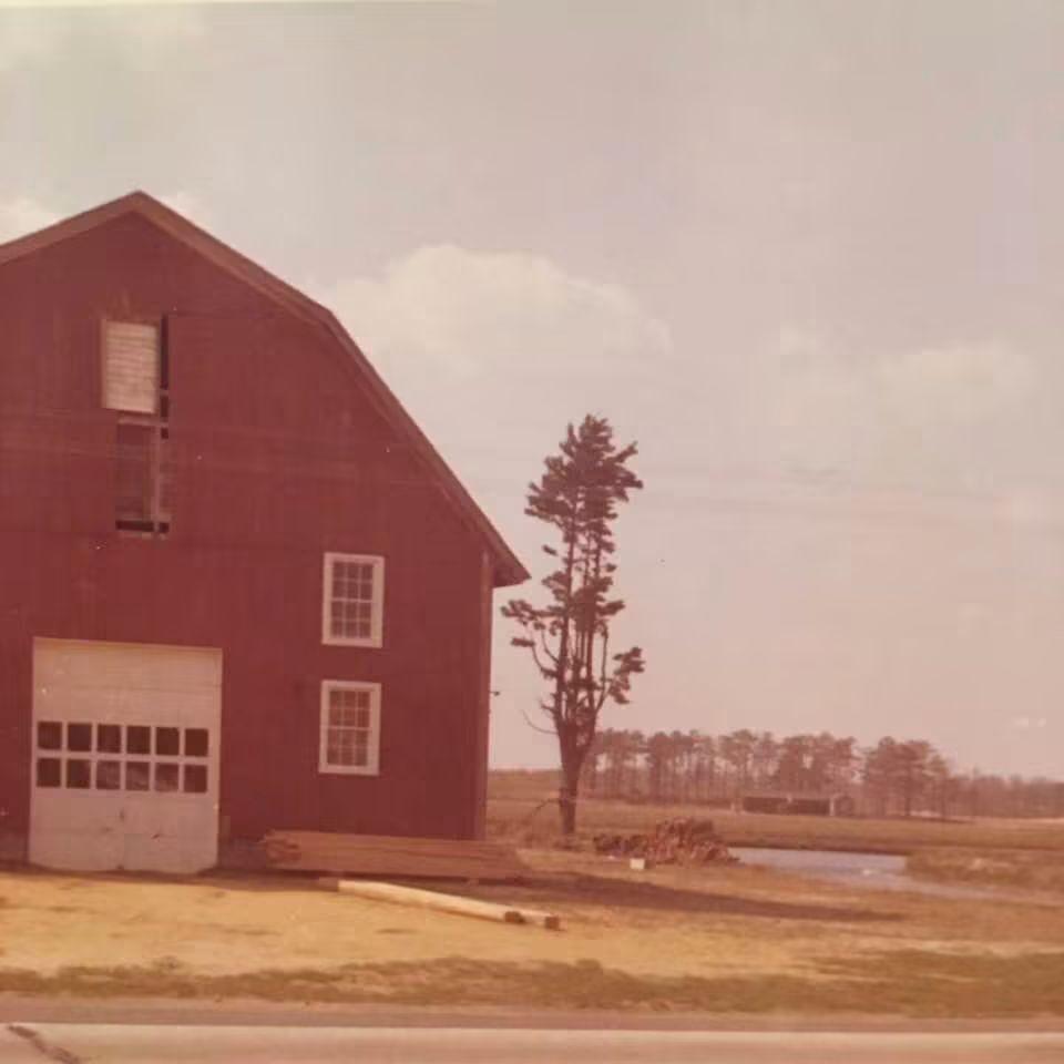 The red barn after it was moved across Route 206, next to the pond